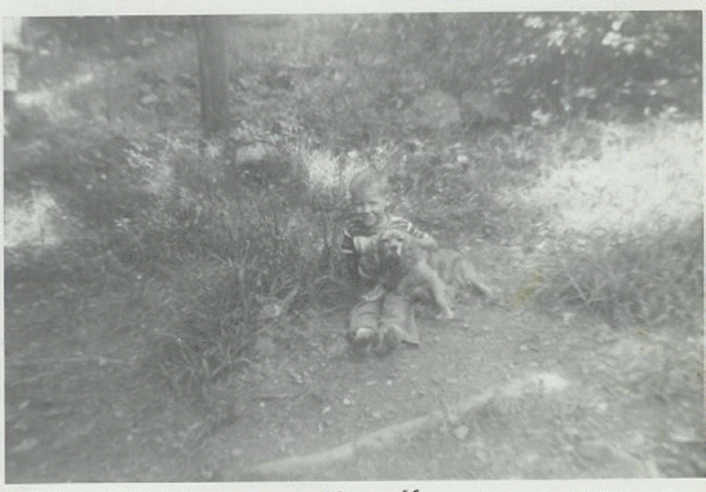John Gold with pet stubby - 1956.GIF
